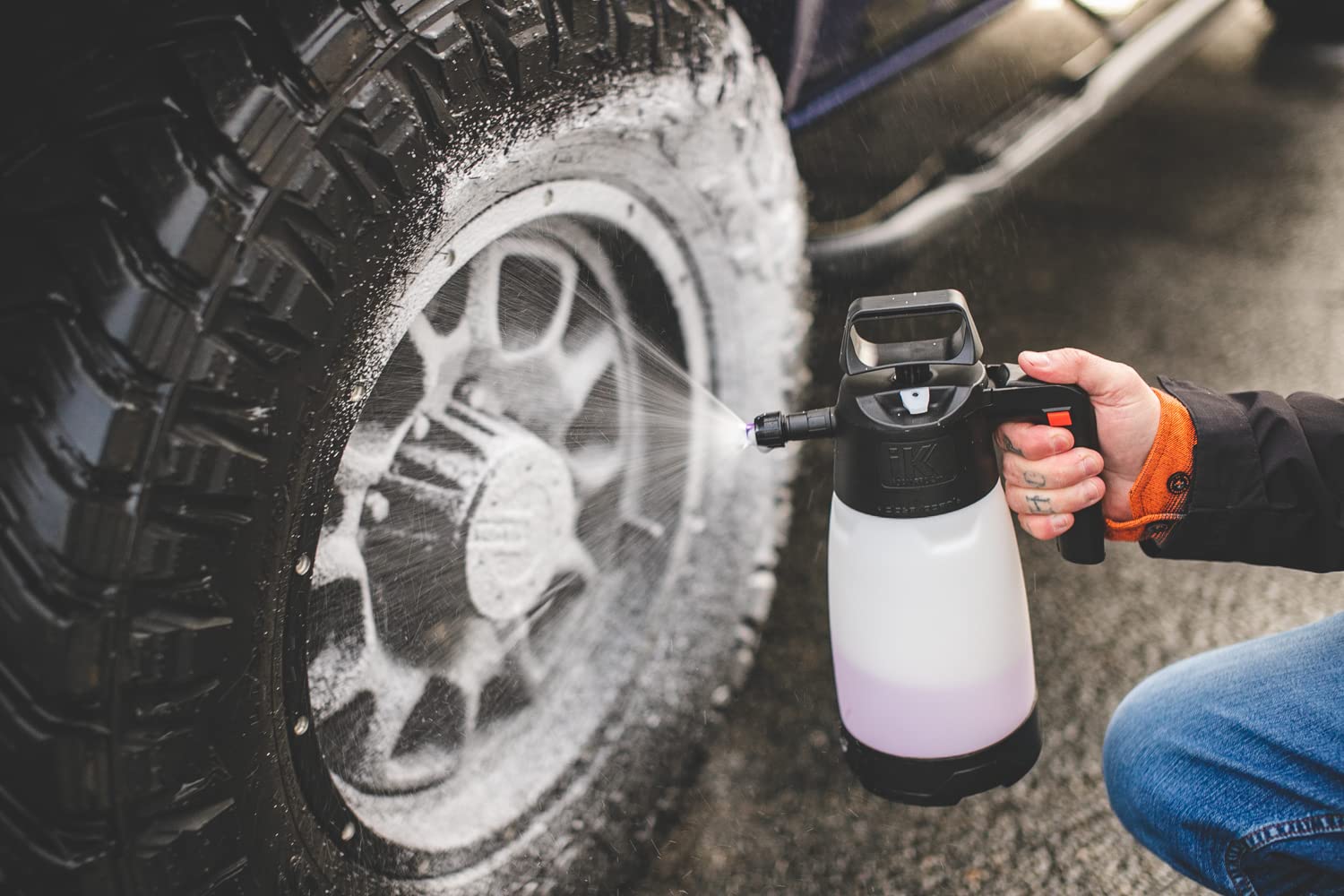 IK FOAM Pro used on a car during detailing, brand delivering cling and coverage