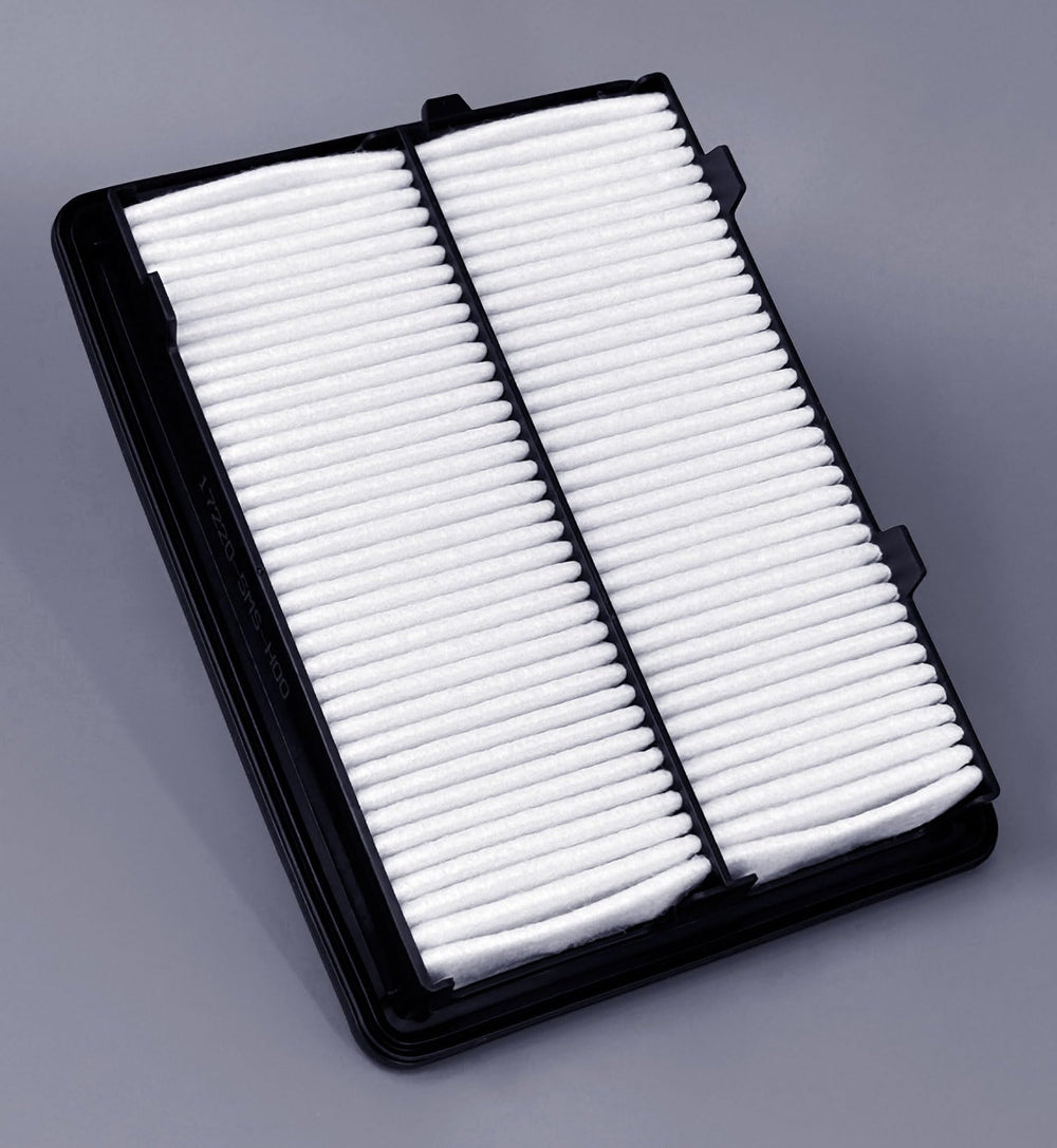 ITESIER engine filter being installed under hood, simplifies routine maintenance