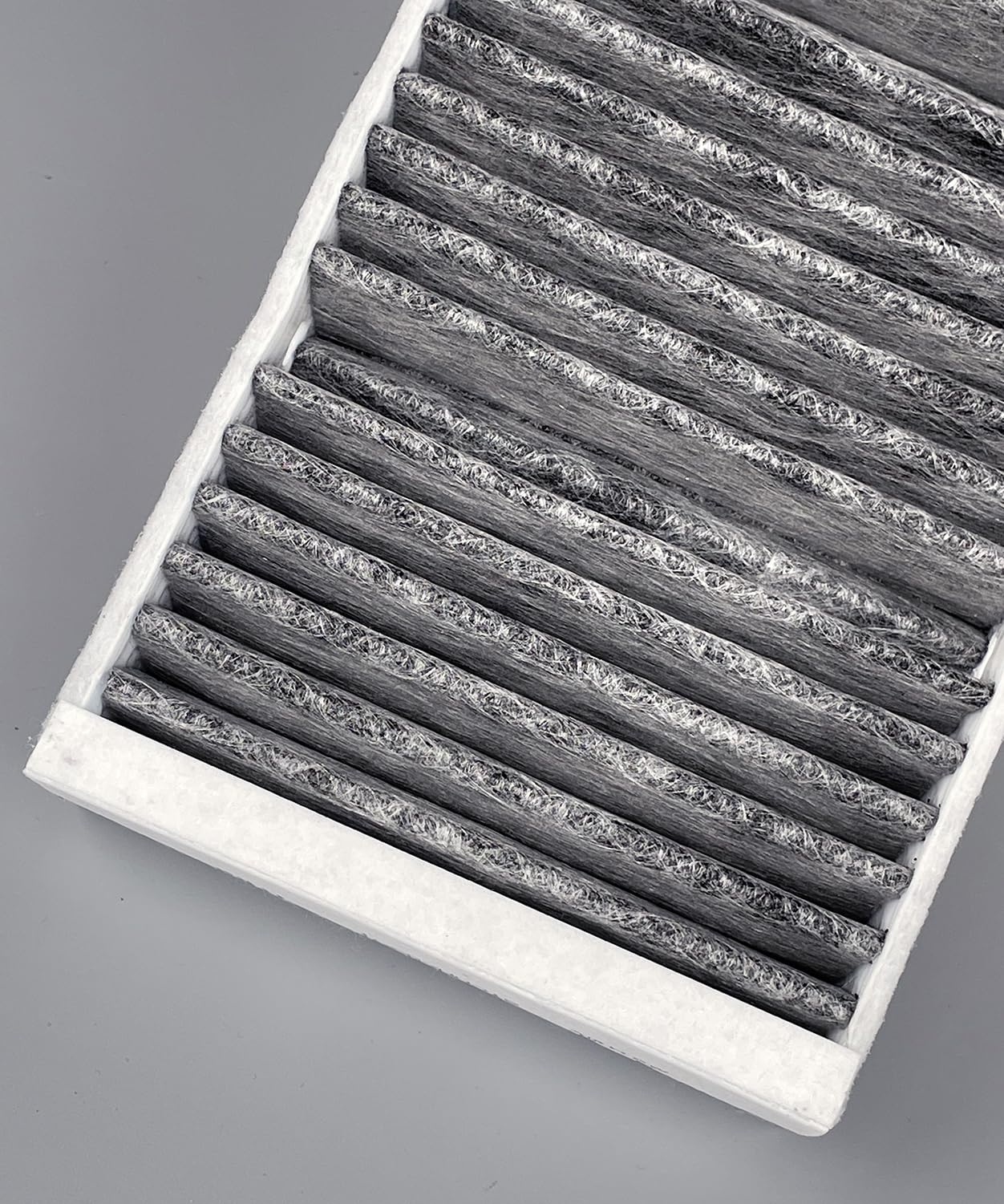 ITESIER filter next to ruler illustrating exact dimensions for correct fit