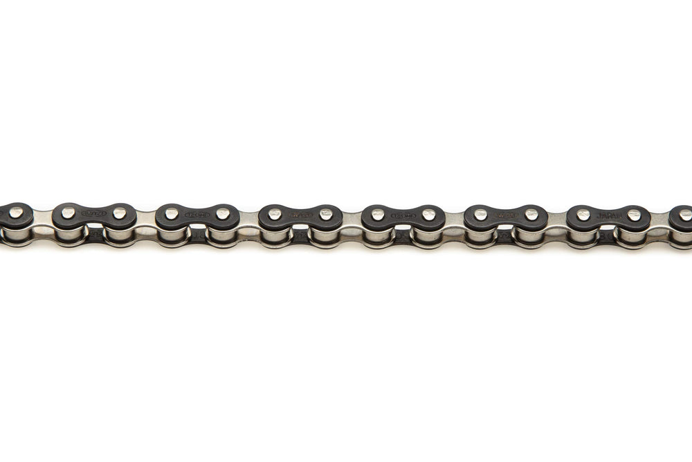 Izumi chain beside ruler showing 116 links for easy sizing and fit verification