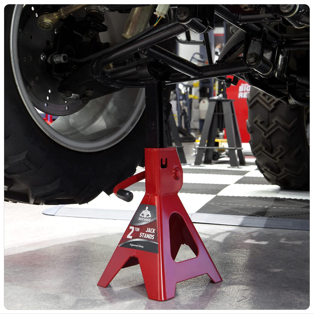jack boss under-car in-use scene showing reliable support while working