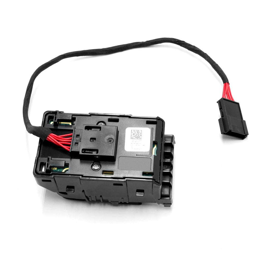 Jaronx driver switch in Tesla interior showing restored controls and matching trim