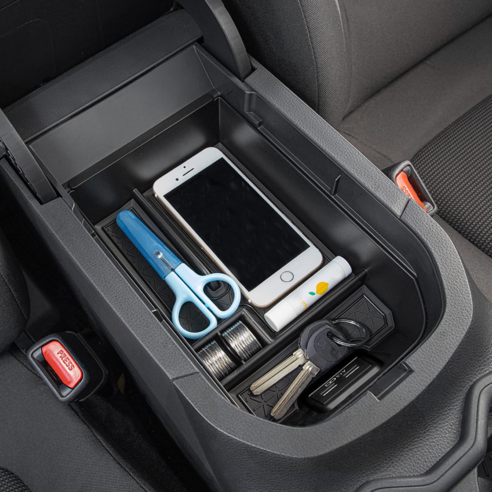 JDMCAR demonstrating under-tray space for larger items and hidden storage