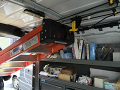 JET Rack mounted on van ceiling illustrating space-saving storage benefit