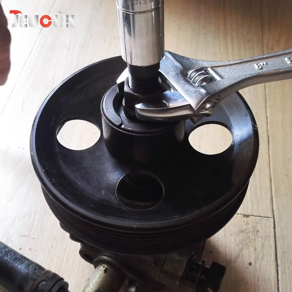 JEUCLEL tool in use removing a power steering pulley, protects pump shaft
