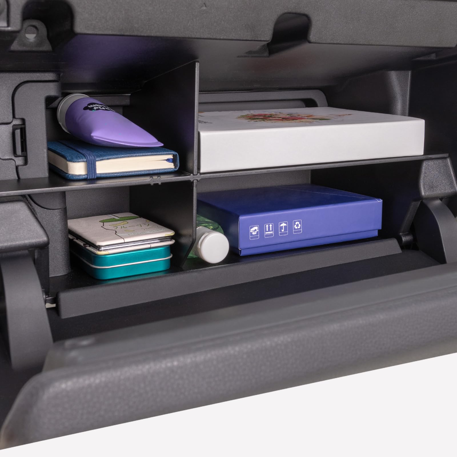 JKCOVER being pushed into glove box during installation showing tool-free setup