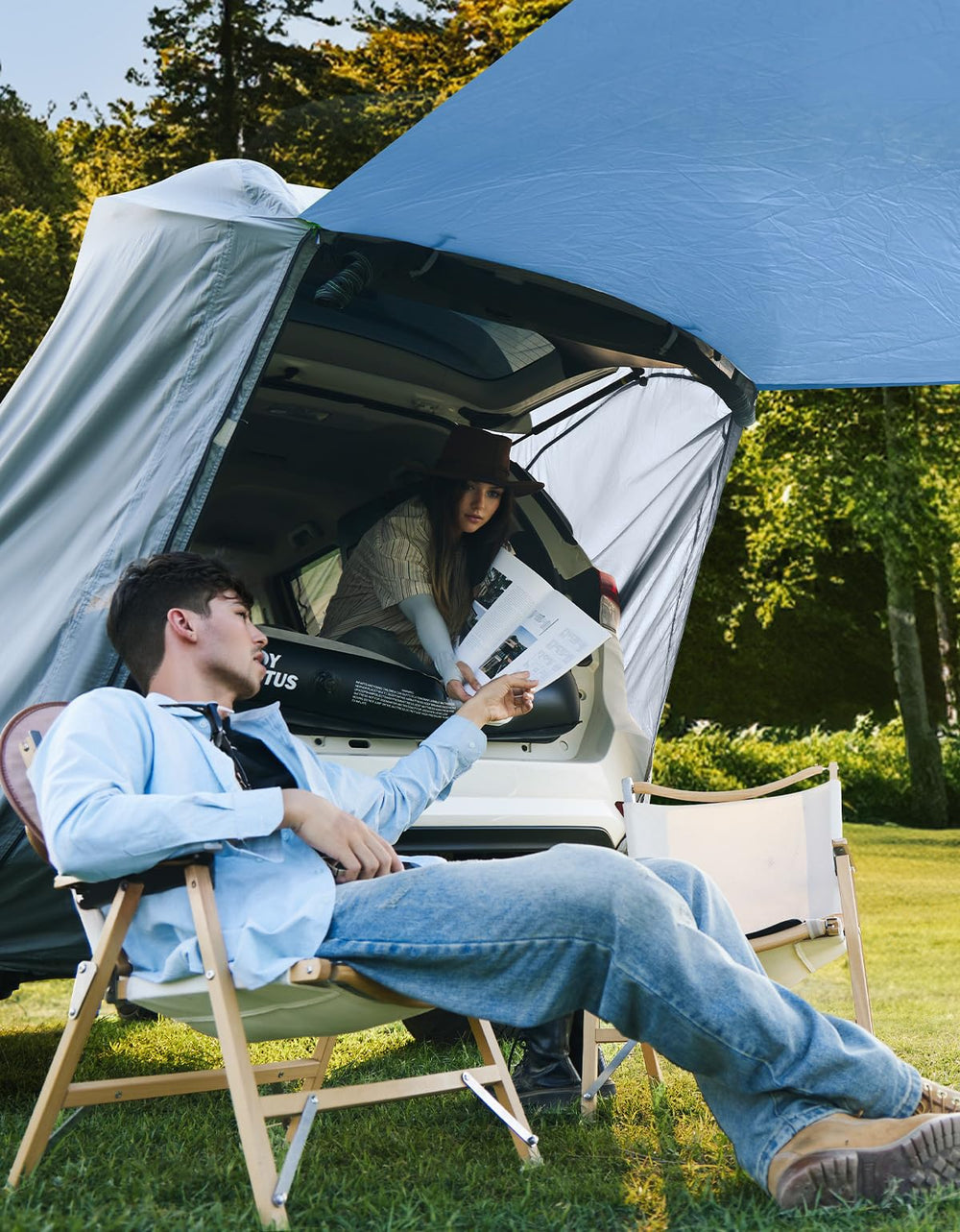 JOYTUTUS awning extended with table and chairs offering shaded dining space