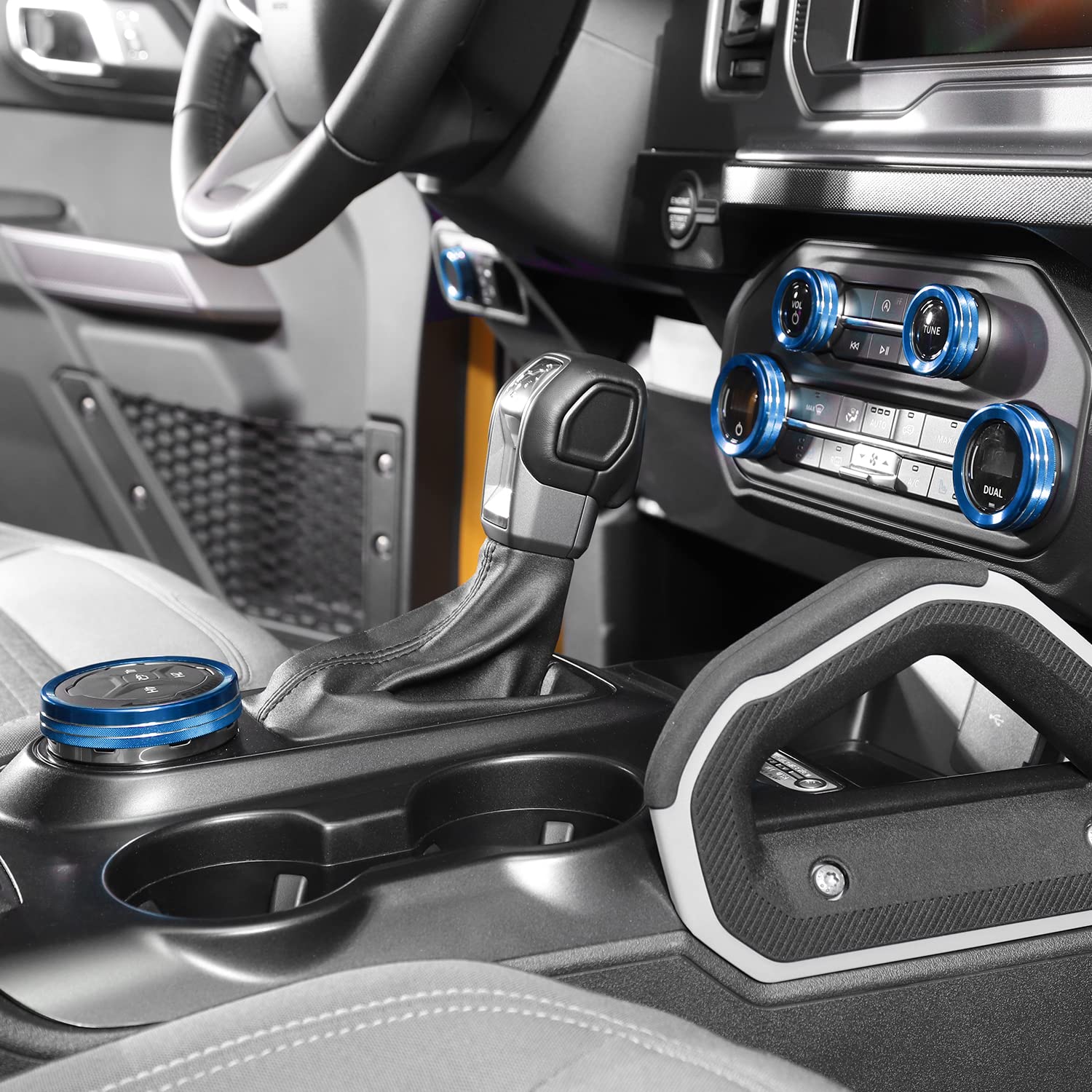 JWWY lifestyle shot of driver view interior, blue accents enhance cabin look