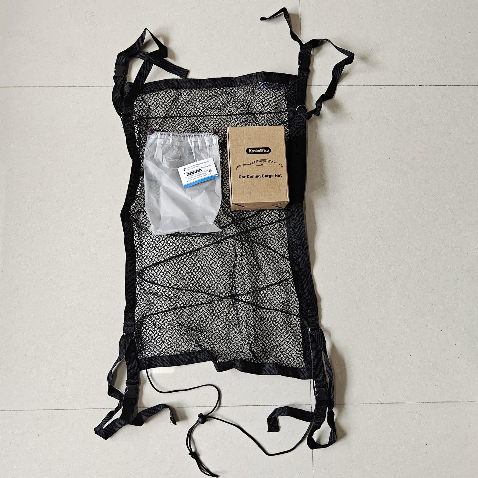 Kaskawise net size comparison beside passenger showing compact, space-saving fit