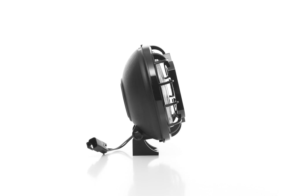 KC Apollo Pro held in hand to show compact size and easy fit benefit