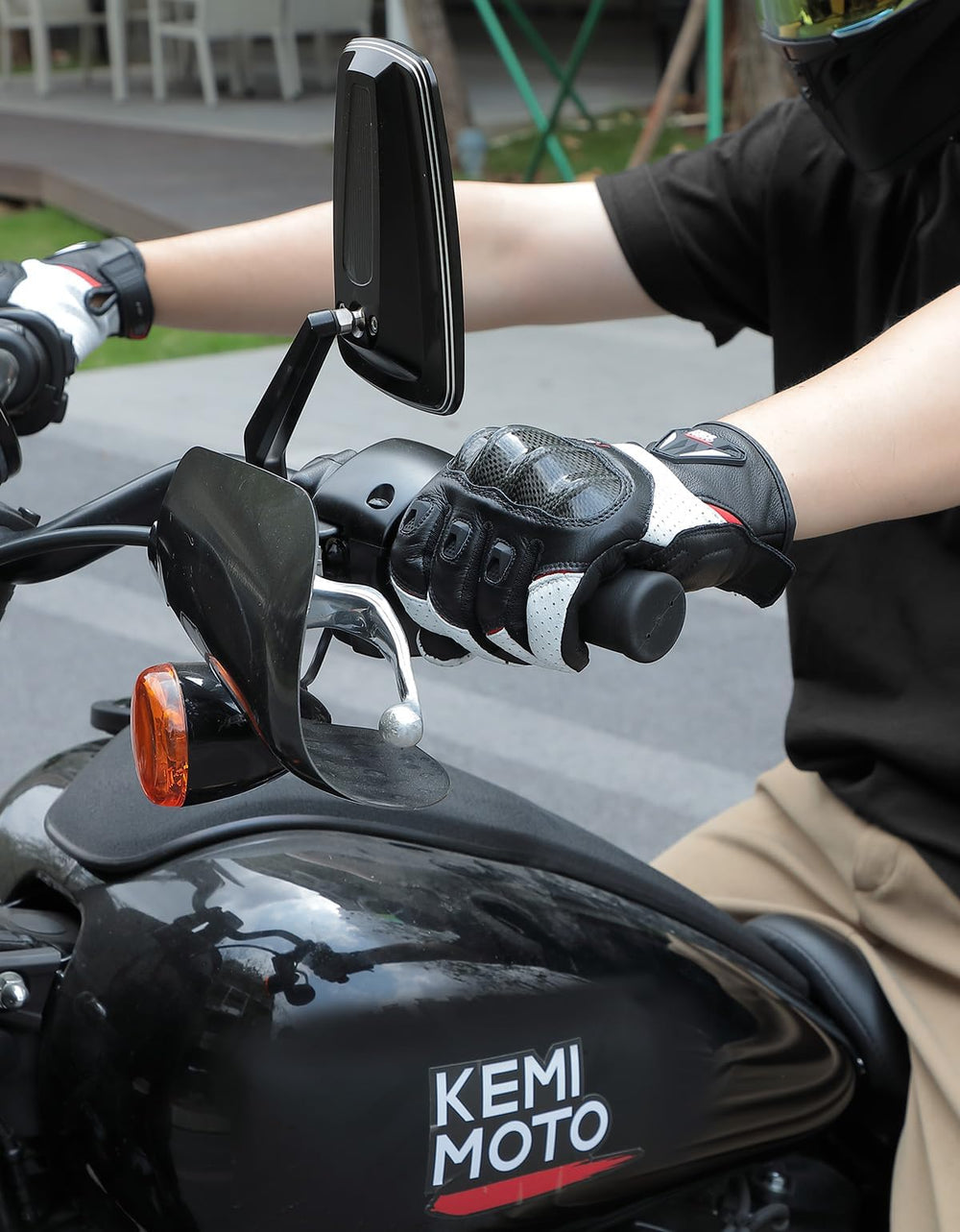 KEMIMOTO gloves worn on a dirt bike demonstrating real-world use