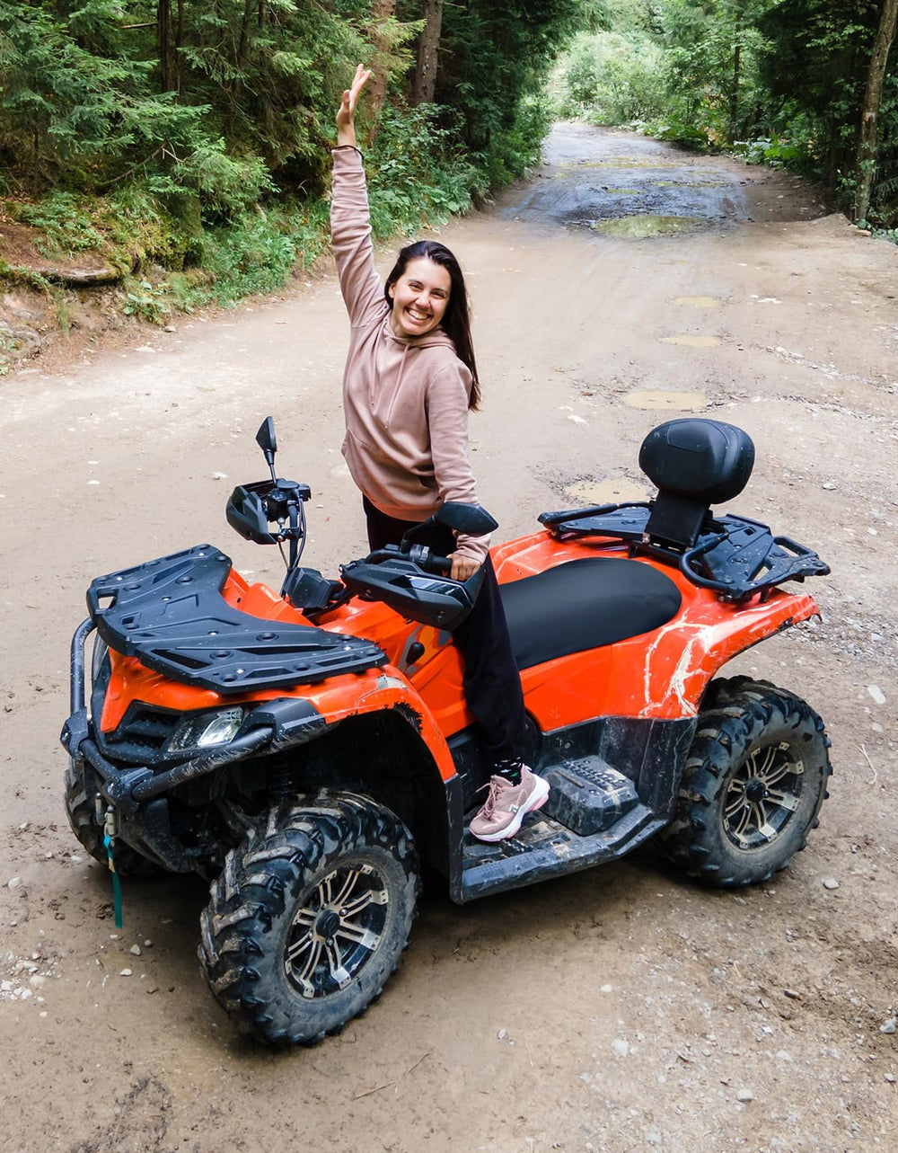 KEMIMOTO ATV with cover on trail demonstrating protection in use