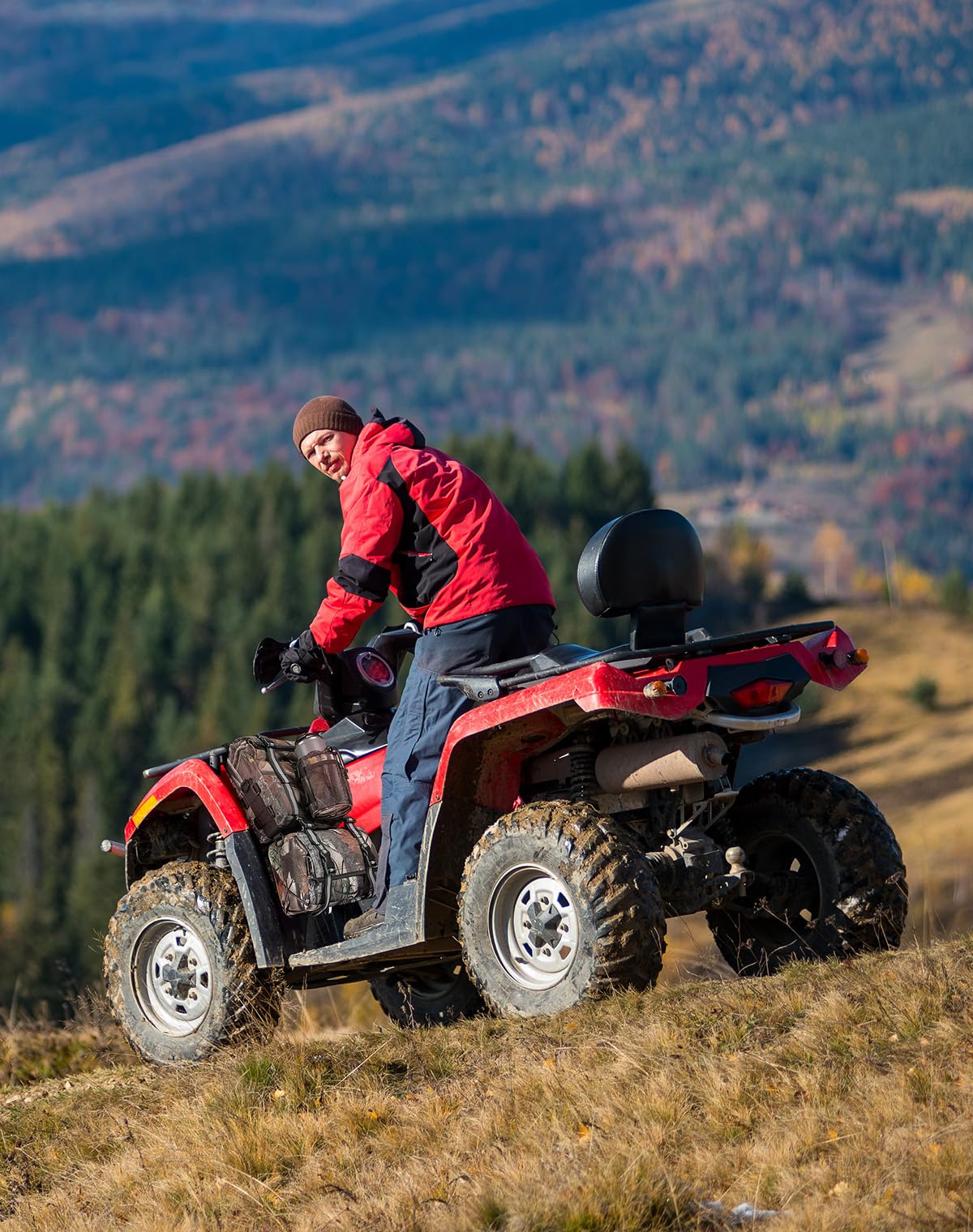 KEMIMOTO bag on ATV rack showing scale and compact storage capacity