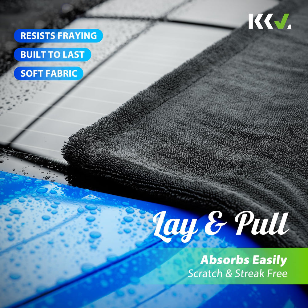 KKV towel drying a car hood demonstrating fast water pickup and streak-free finish