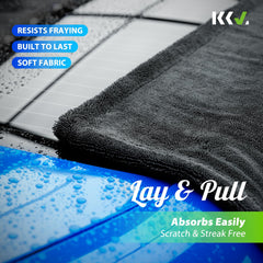 KKV towel drying a car hood demonstrating fast water pickup and streak-free finish