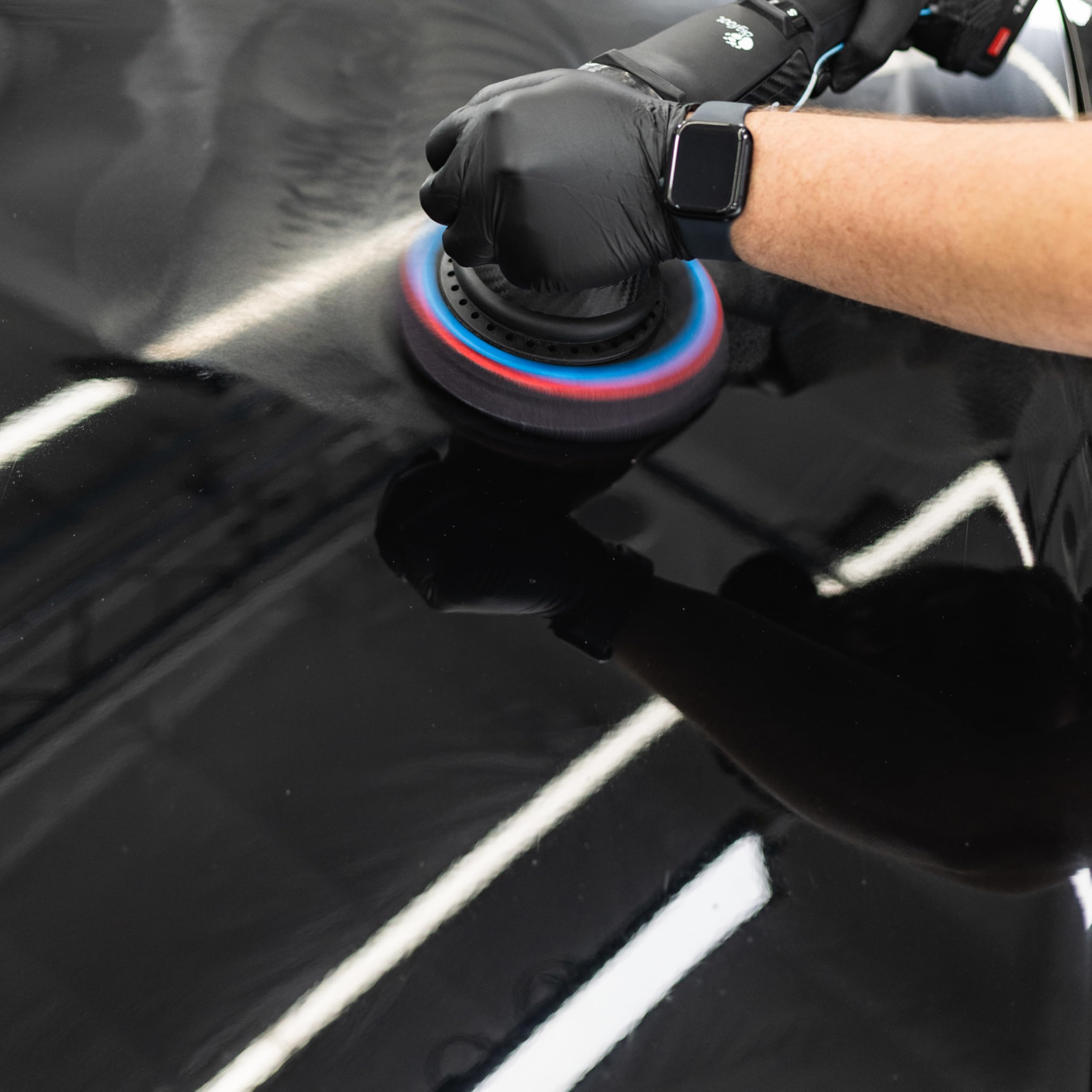 KOCHCHEMIE in-use polishing action on car panel demonstrating strong scratch removal