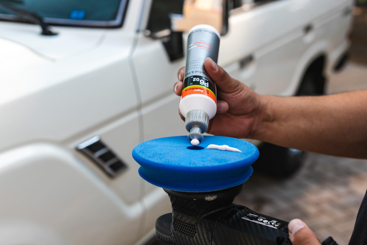 KOCHCHEMIE in use with polisher on car panel demonstrating efficient scratch removal