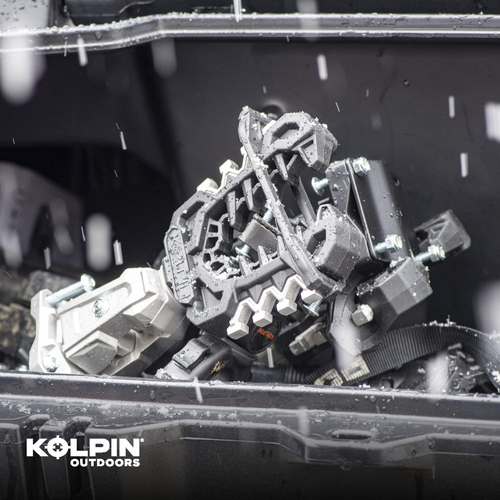 Kolpin Rhino Grip Pro beside weights illustrating 50+ lb capacity benefit