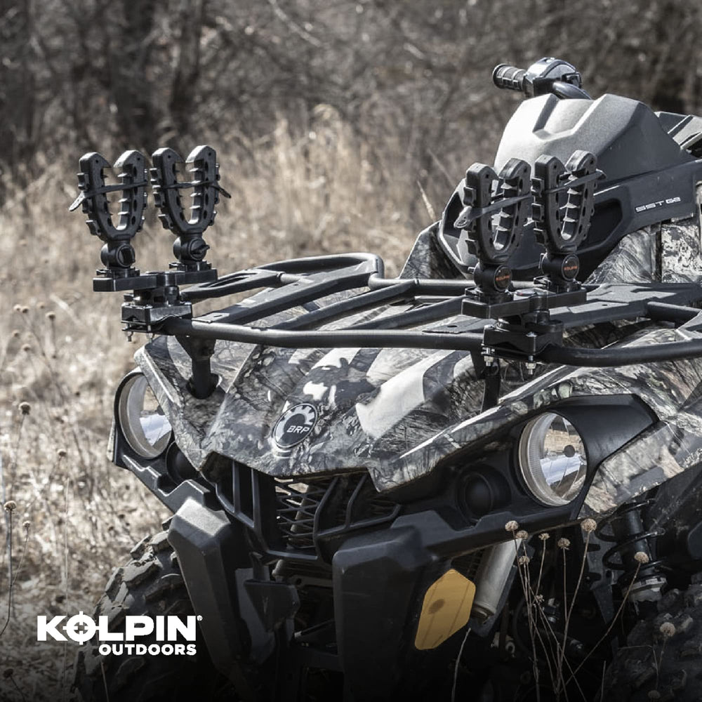Kolpin Rhino XL holding a rifle securely in vehicle mount