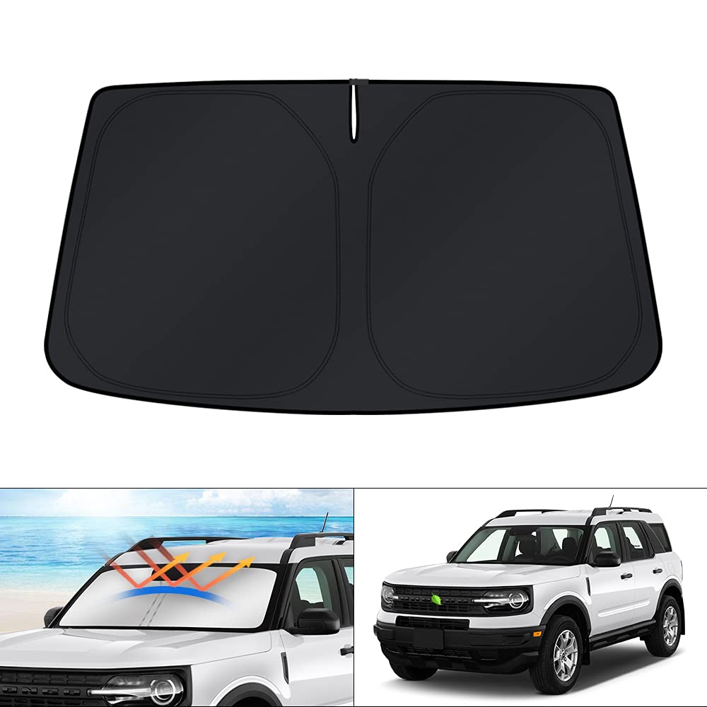 KUST front view showing custom-fit shade protecting windshield for cooler cabin