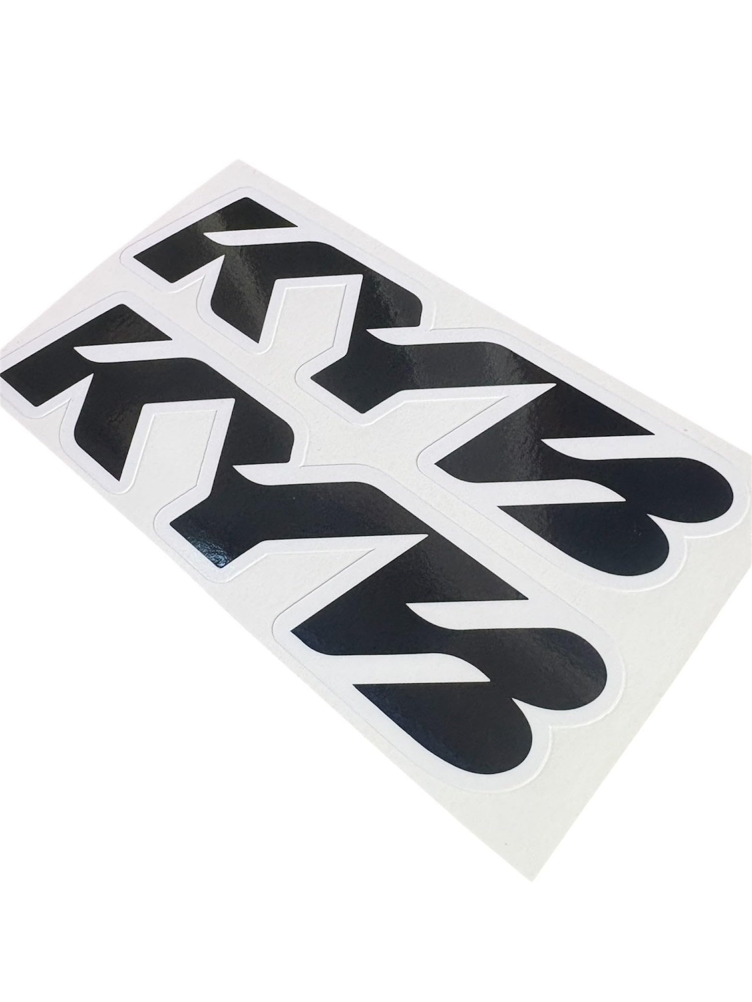 Generic KYB next to ruler showing 1.5 x 6 inch decal size for fit confirmation