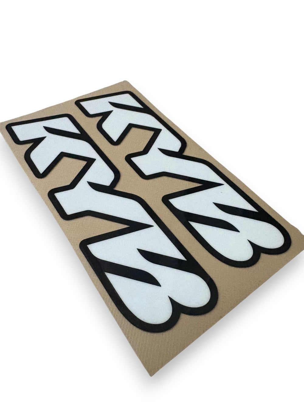 KYB sticker on trail bike showing upgraded aesthetics for e-moto riders benefit