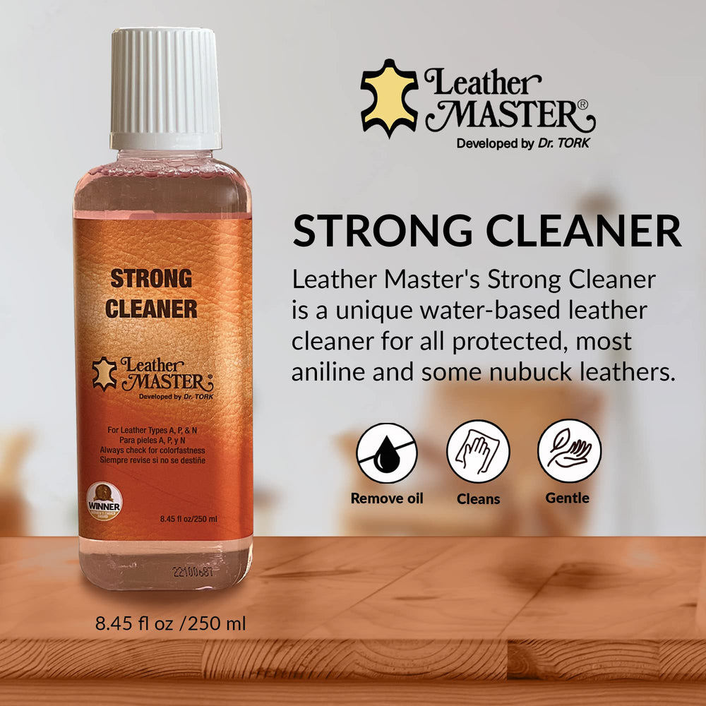 Leather Master treating a handbag to restore color and guard against stains