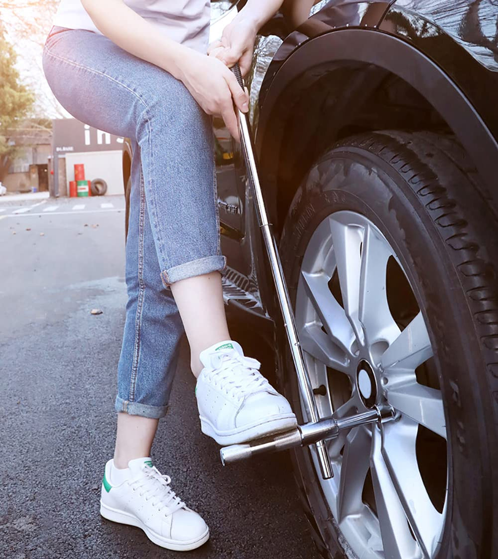 LEJOSTOL roadside scene with wrench in use for quick emergency tire change