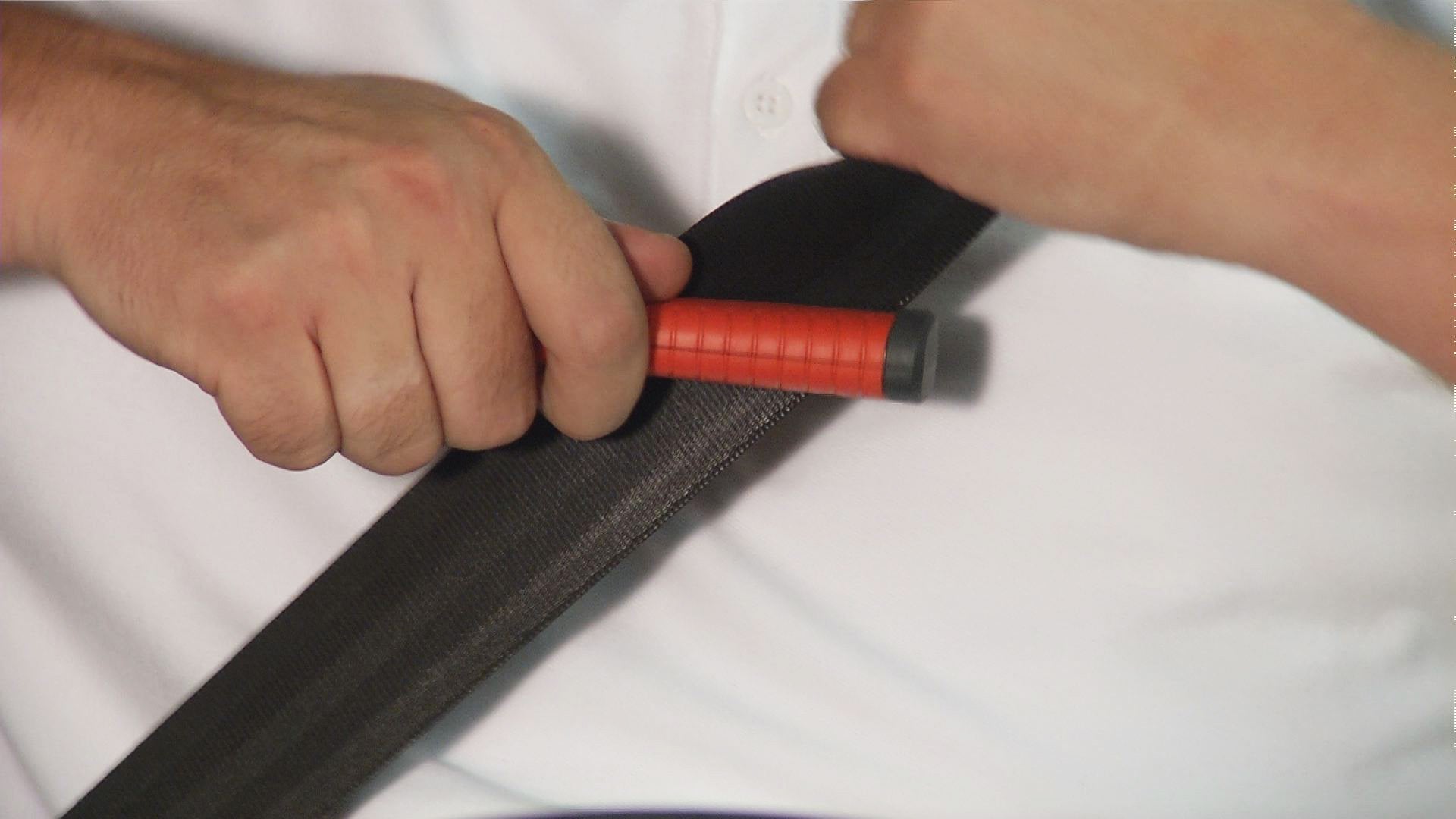 Lifehammer placed inside vehicle demonstrating quick-reach emergency readiness