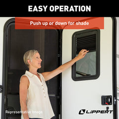 Lippert Components interior view with blind extended offering privacy and adjustable shade