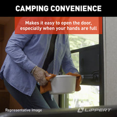 Lippert Components mounted on an RV screen door demonstrating easy hands-free opening