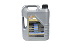 Liqui Moly oil being poured into engine illustrating Special Tec B FE 0W‑30 easy flow and protection