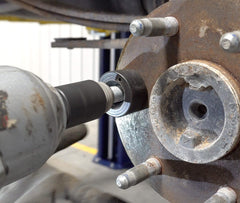 Lisle 22800 in use pulling a wheel stud with an impact wrench for fast seating
