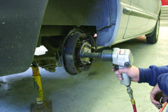 Lisle 22800 next to a ratchet for scale showing compact, portable size