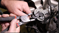 Lisle 37160 in use depressing fuel connector tabs for safe release