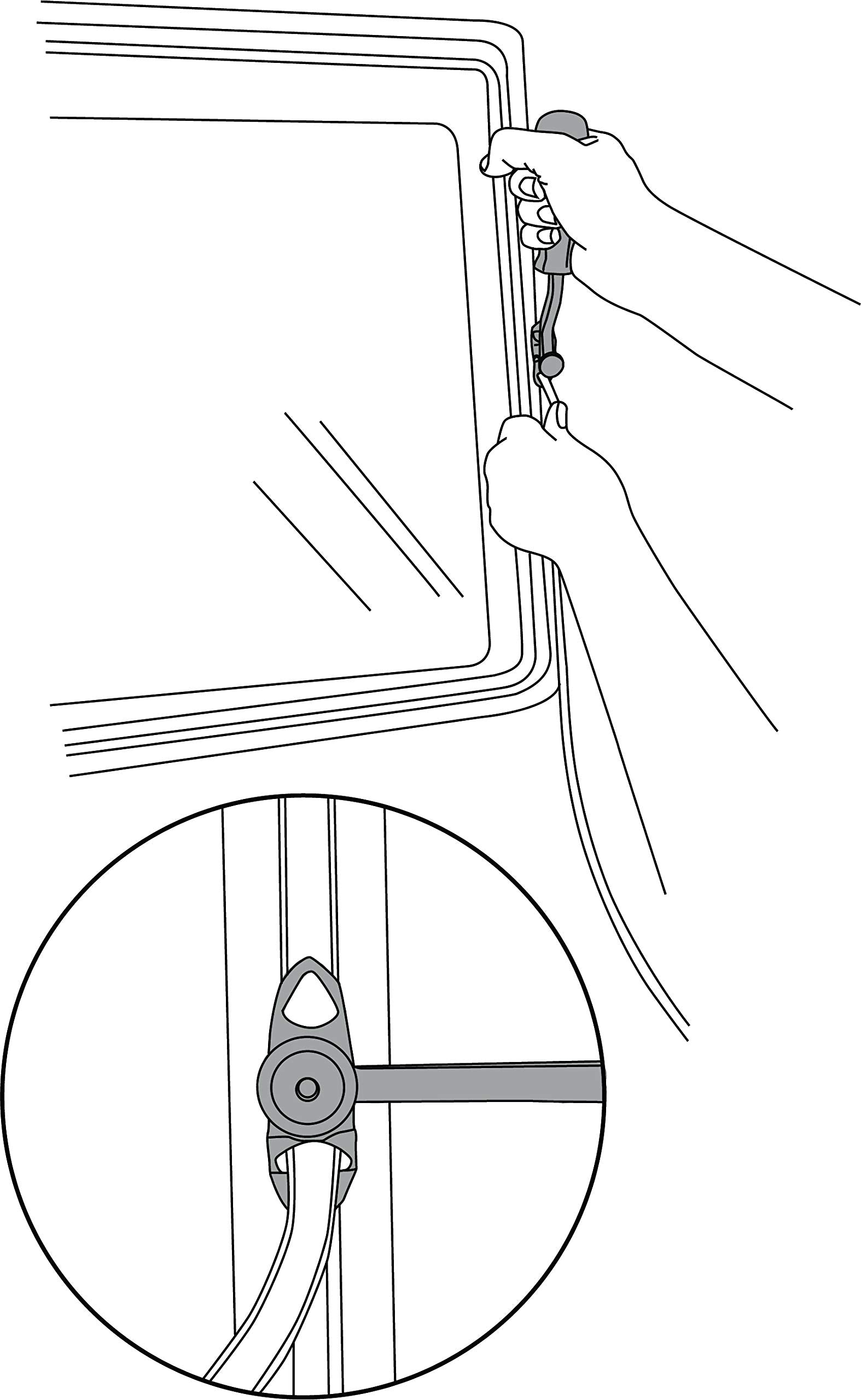 Lisle tool in use on semi windshield illustrating reach and precise strip seating