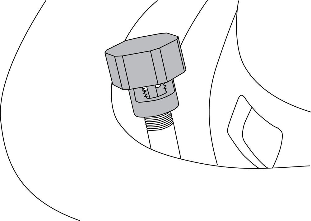 Lisle deflator close-up on valve core demonstrating safe core depression