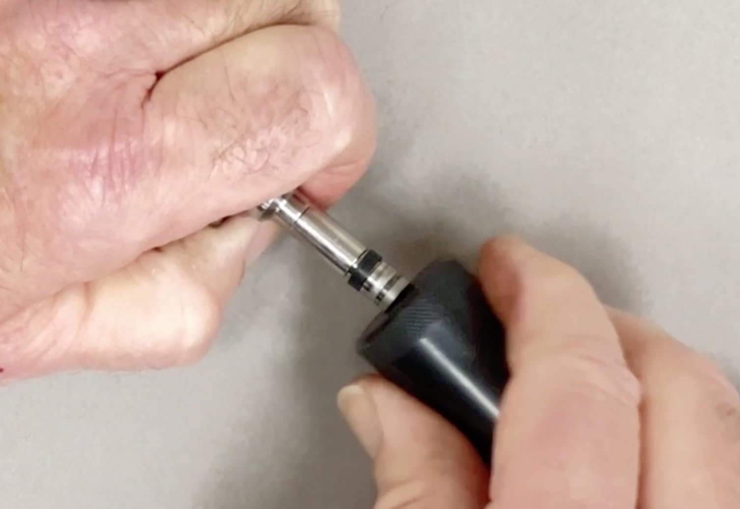 Lisle close-up of pilot cones and sizers demonstrating precision fit to protect injector tips