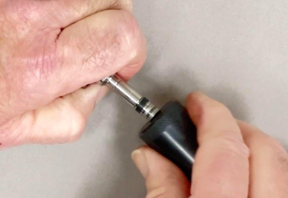 Lisle close-up of pilot cones and sizers demonstrating precision fit to protect injector tips