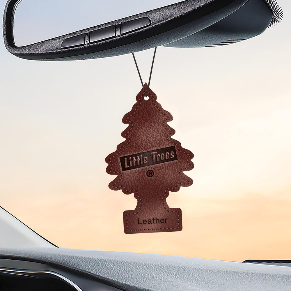 LITTLE TREES Leather freshener suspended in a closet refreshing garments and linens