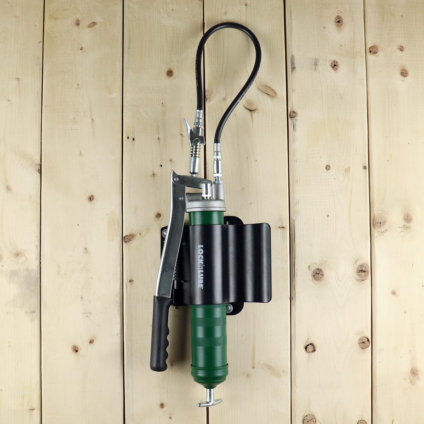 LockNLube holder with grease gun in place enabling quick access during service