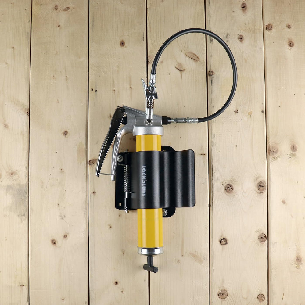 LockNLube holder shown with bolts for scale and easy-installation clarity