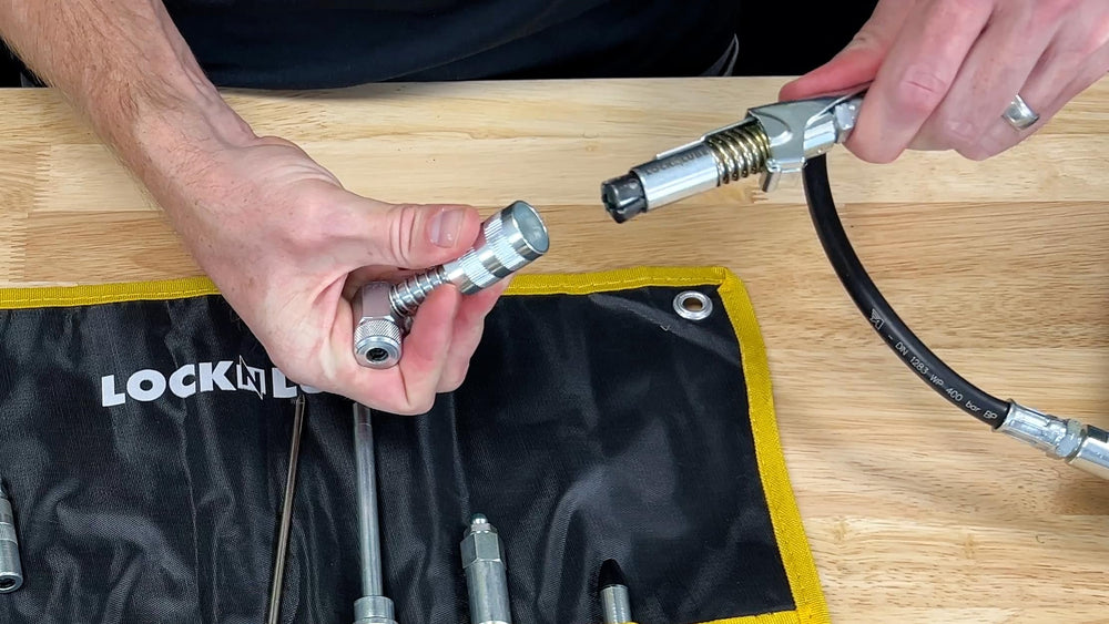 LockNLube roll case hanging with grommets for organized shop access