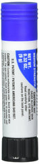 Loctite applicator tip close-up showing waxy stick for precise application