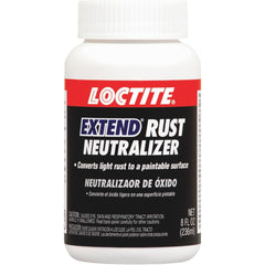 Loctite being brushed onto metal railing, showing conversion and prep benefit