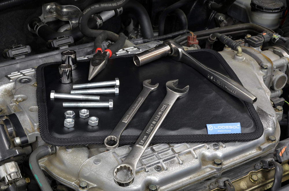 Lodesol magnetic surface holding sockets and wrenches securely in place