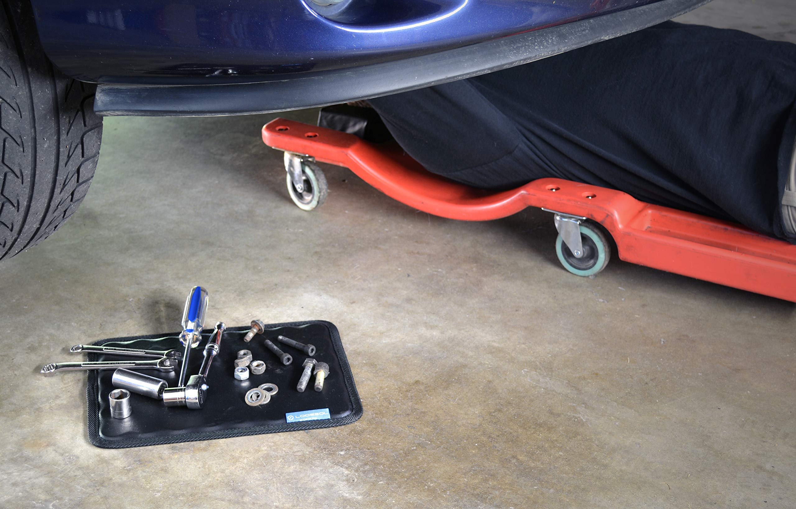 Lodesol mounted on toolbox lid keeping tools organized during repairs