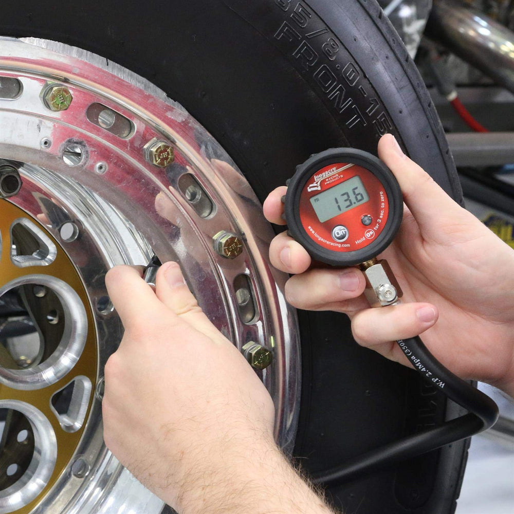 Longacre gauge beside ruler showing compact size for portable convenience