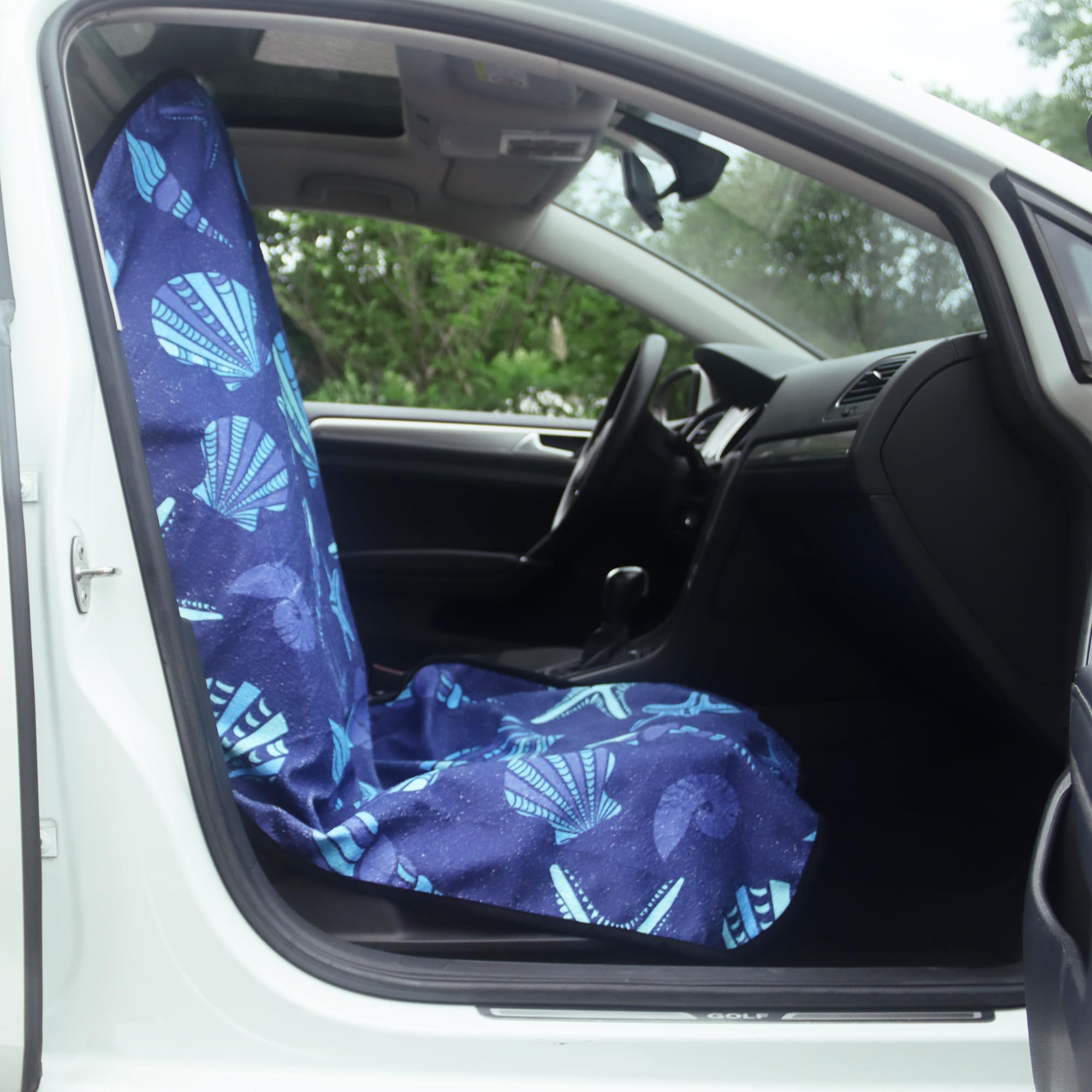 LoyaGour seat cover next to measuring tape showing 29.5 by 56 inches