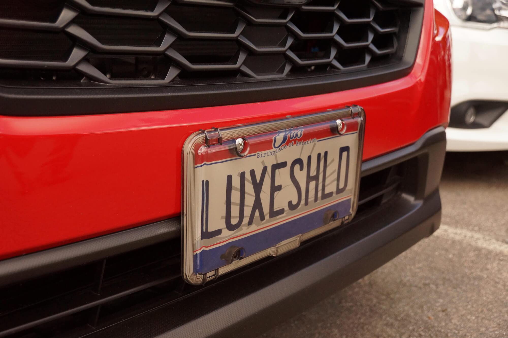 Luxe Shield packaging and warranty card illustrating American-made quality and support benefit